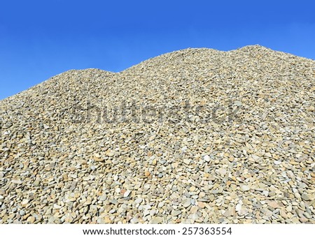 A pile of washed river gravel