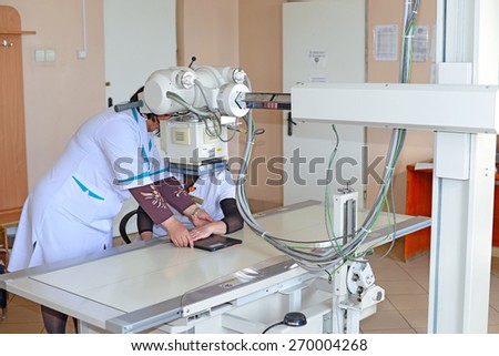 Kalush, Ukraine - April 16: Diagnostic examination in X-ray cabinet in Municipal Medical Center of Kalush, Western Ukraine April 16, 2015
