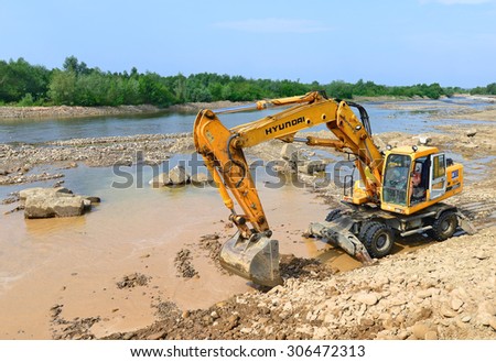Kalush, Ukraine - July 2: On the construction of a protective dam near the town of Kalush, Western Ukraine July 2, 2015