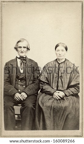US - OHIO - CIRCA 1860 - A vintage Cartes de visite photo of an elderly couple. The man and wife are sitting next to each other. A photo from the Civil War era. CIRCA 1860
