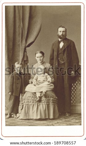 EUROPE - POLAND - CIRCA 1875 A vintage Carte De Visite of a polish family. There is a mother and father with their two children, one boy and one gril. This photo is from the Victorian era. CIRCA 1875