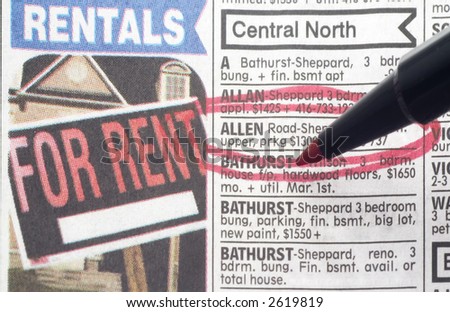 ad for apartment rental circled in red in newspaper