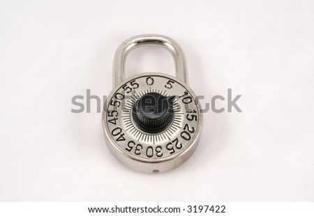 Closed combination padlock over white background