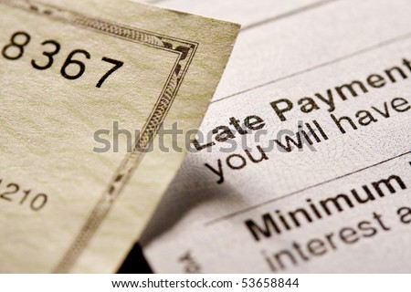 Late payment. Shot with shallow depth of field.