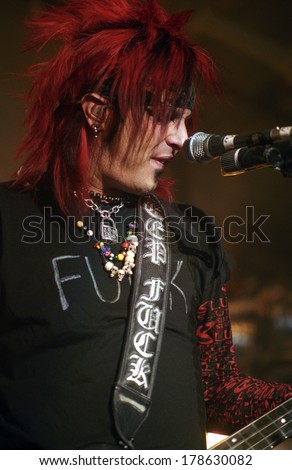 DENVER	DECEMBER 18:		Bassist Nikki Sixx of the Heavy Metal band Motley Crue performs in concert December 18, 1998 at Mammoth Arena in Denver, CO.