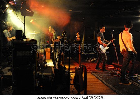 DENVER	JUNE 26:		Rock band Miggs performs in concert June 26, 2014 at the venue Ecks in Denver, CO.