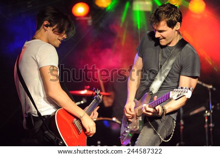 DENVER	JUNE 26:		Vocalist/Guitarist Don Miggs and Guitarist John Luzzi of the Rock band Miggs perform in concert June 26, 2014 at the venue Ecks in Denver, CO.