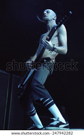 DENVER	AUGUST 22:		Bassist Shavo Odadijian of the Heavy Metal band System of a Down performs in concert August 22, 2002 at the Pepsi Center in Denver, CO.