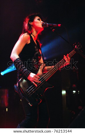 DENVER - APRIL 21:	Bassist Emma Anzai of the Alternative Rock band Sick Puppies performs in concert April 21, 2011 at the Ogden Theater in Denver, CO.