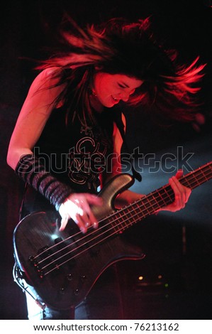 DENVER - APRIL 21:	Bassist Emma Anzai of the Alternative Rock band Sick Puppies performs in concert April 21, 2011 at the Ogden Theater in Denver, CO.