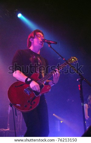DENVER - APRIL 21:	Vocalist/Guitarist Shimon Moore of the Alternative Rock band Sick Puppies performs in concert April 21, 2011 at the Ogden Theater in Denver, CO.