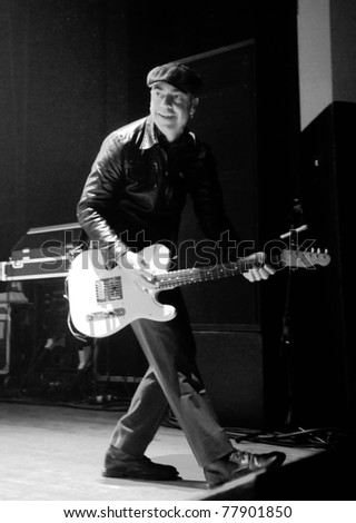 COLORADO SPRINGS, CO. USA – MAY 4:	Guitarist Dennis Casey of the Alternative band Flogging Molly performs in concert May 4, 2011 at the City Auditorium in Colorado Springs, CO. USA
