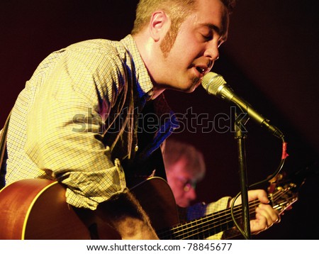 COLORADO SPRINGS, CO. USA – APRIL 8:	Vocalist/Guitarist Andy Clifton of the Acoustic Rock band Andy Clifton & Co. performs in concert April 8, 2006 at the Antlers Ballroom in Colorado Springs, CO. USA