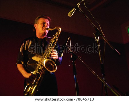 COLORADO SPRINGS, CO. USA – APRIL 8:	Saxophonist Chuck Frazier of the Acoustic Rock band Andy Clifton & Co. performs in concert April 8, 2006 at the Antlers Ballroom in Colorado Springs, CO. USA