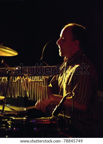 COLORADO SPRINGS, CO. USA – APRIL 8:	Percussionist Teddy Nazario of the Acoustic Rock band Andy Clifton & Co. performs in concert April 8, 2006 at the Antlers Ballroom in Colorado Springs, CO. USA