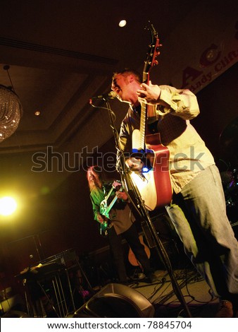 COLORADO SPRINGS, CO. USA – APRIL 8:	Vocalist/Guitarist Andy Clifton of the Acoustic Rock band Andy Clifton & Co. performs in concert April 8, 2006 at the Antlers Ballroom in Colorado Springs, CO. USA