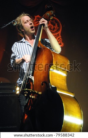 DENVER	JUNE 15:	String Bass/Drummer/Guitarist Ted Dwane of the Folk Rock band Mumford & Sons performs in concert June 15, 2011 at the Fillmore Auditorium in Denver, CO.