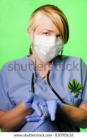 Image of a healthcare professional wearing surgical scrubs, stethoscope and mask presenting a marijuana joint on a chroma key background