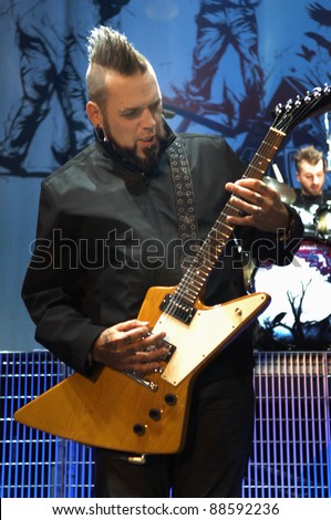 DENVER	OCTOBER 5:	Guitarist Barry Stock of the Heavy Metal band Three Days Grace performs in concert October 5, 2011 at the Comfort Dental Amphitheater in Denver, CO.
