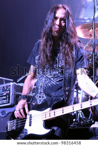 DENVER - OCTOBER 19: Bassist Greg Christian of the Heavy Metal band Testament performs in concert October 19, 2011 at the Summit Music Hall in Denver, CO.