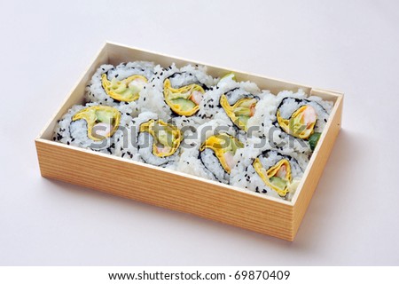 Assorted sushi lunch box on white background 8