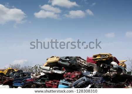 junk yard with old cars and wreck