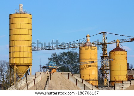 concrete factory with crane and tanks industry zone