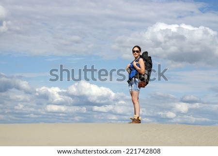 beautiful girl hiking in desert