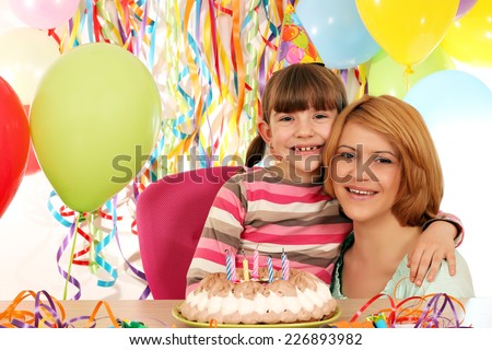 happy daughter and mother on birthday party