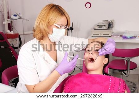 Dentist gives the patient an injection