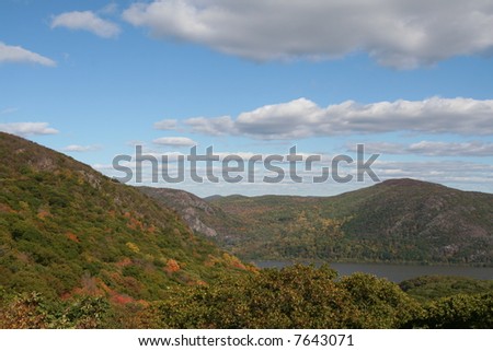 Looking across the Hudson River at Bull Hill & Breakneck Ridge, one of the top hiking spots in NY (partially hidden) on the left.