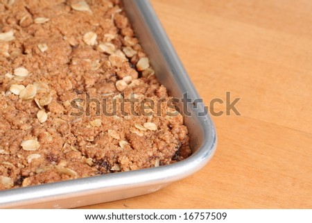 Baked Date Bars with crumb topping, still in Baking Sheet