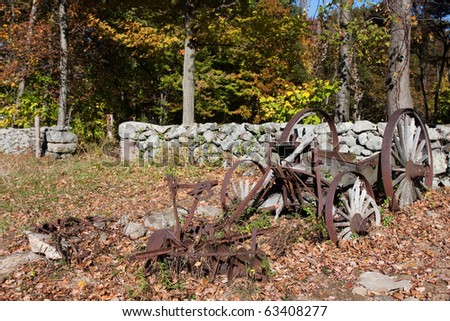 Old and rusted farm equipment on the grounds of Weir Farm, a historic landmark in Wilton, Connecticut.