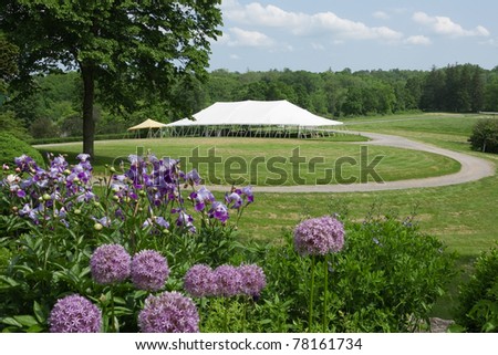 Large event tent in a beautiful setting.
