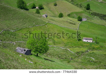 Typical landscape of Cantabria with cabins and plots