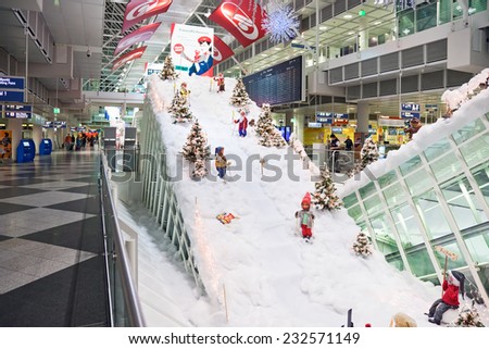 MUNICH, GERMANY - DECEMBER 24, 2009: Christmas decorations at Munich airport in Germany. Ski resort, gnomes skiing between Christmas trees. Munich Airport It is the second busiest airport in Germany.
