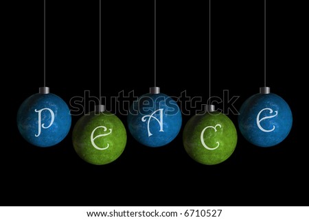 green and blue ornaments that spell peace