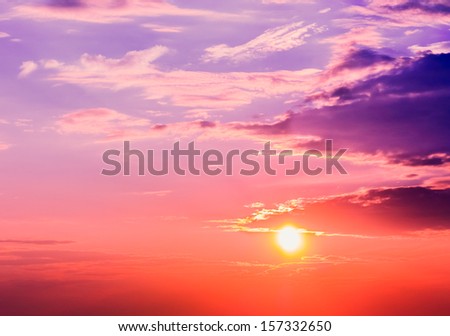 The Sun Shining Over Low Cloud. Pink, purple, orange sky colors sunset, sunrise
