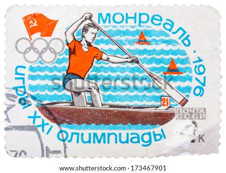 USSR - CIRCA 1976: Stamp printed in Russia (Soviet Union), Summer Olympics in Montreal, canoeing, athlete is swimming in a boat with a paddle, circa 1976