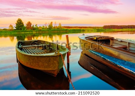 Autumn River And Old Green Rowing Boats. Russian Landscape, Nature