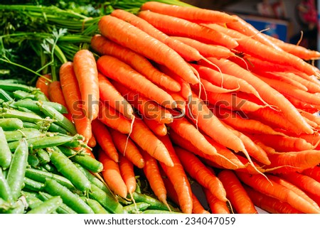 Fresh Vegetables Organic Green Beans And Orange Carrots. Production Of Local Food Market.