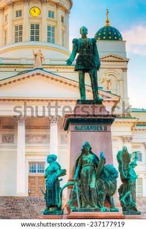 Statue Of Emperor Alexander II Of Russia Before The Helsinki Cathedral Background