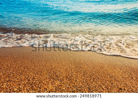 Soft Sea Ocean Waves Wash Over Golden Sand Background