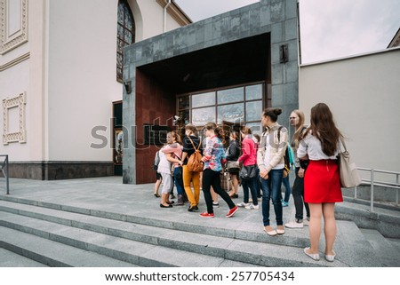 MINSK, BELARUS - June 3, 2014:  Young women stand in line at the Concert Hall \