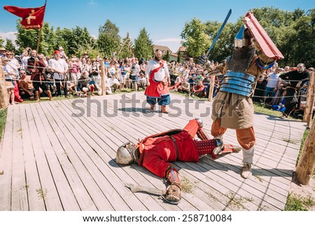 MINSK, BELARUS - JULY 19, 2014: Historical restoration of knightly fights on festival of medieval culture