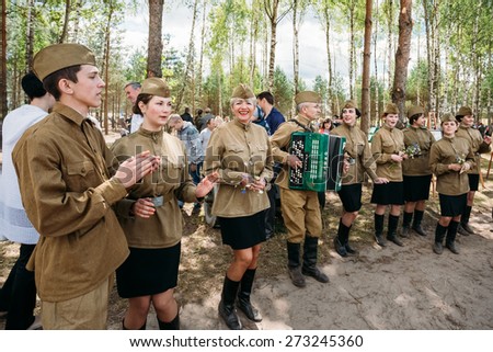 SVETLAHORSK, BELARUS - JUNE 21, 2014: Unidentified artists dressed as Soviet Russian soldiers dance during events dedicated to 70th anniversary of Soviet Belorussian offensive operation \