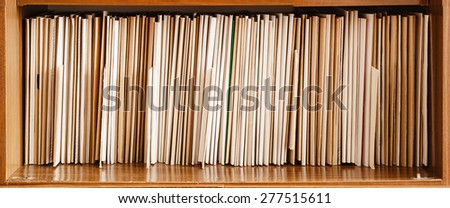 Retro Vintage Keeping Records On Yellow Shelves, Business Background