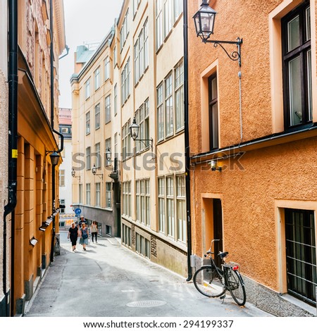 STOCKHOLM, SWEDEN - JULY 29, 2014: Parked Bicycle On Sidewalk In Old European Town. Bike Parking On Street, Stockholm, Sweden