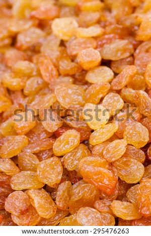 Tasty Golden Dried Raisins Heap On Local Market Background