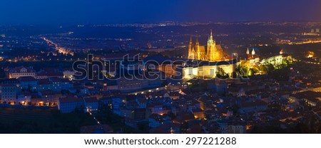 Night panorama of Prague, Czech Republic. Castle, St. Vitus Cathedral. Panoramic night view to Lesser Town, Prague castle and St. Nicholas church. UNESCO heritage sites